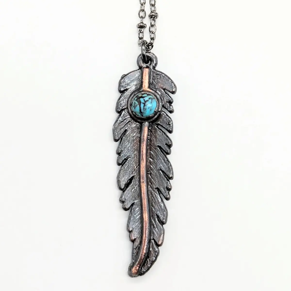 Gunmetal Feather Pendant With Turquoise Necklace 1